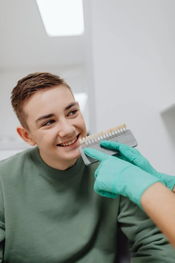 a patient smiling at the dentist